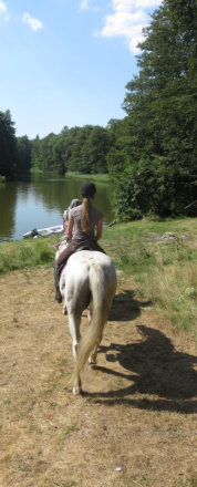 rider at a lake